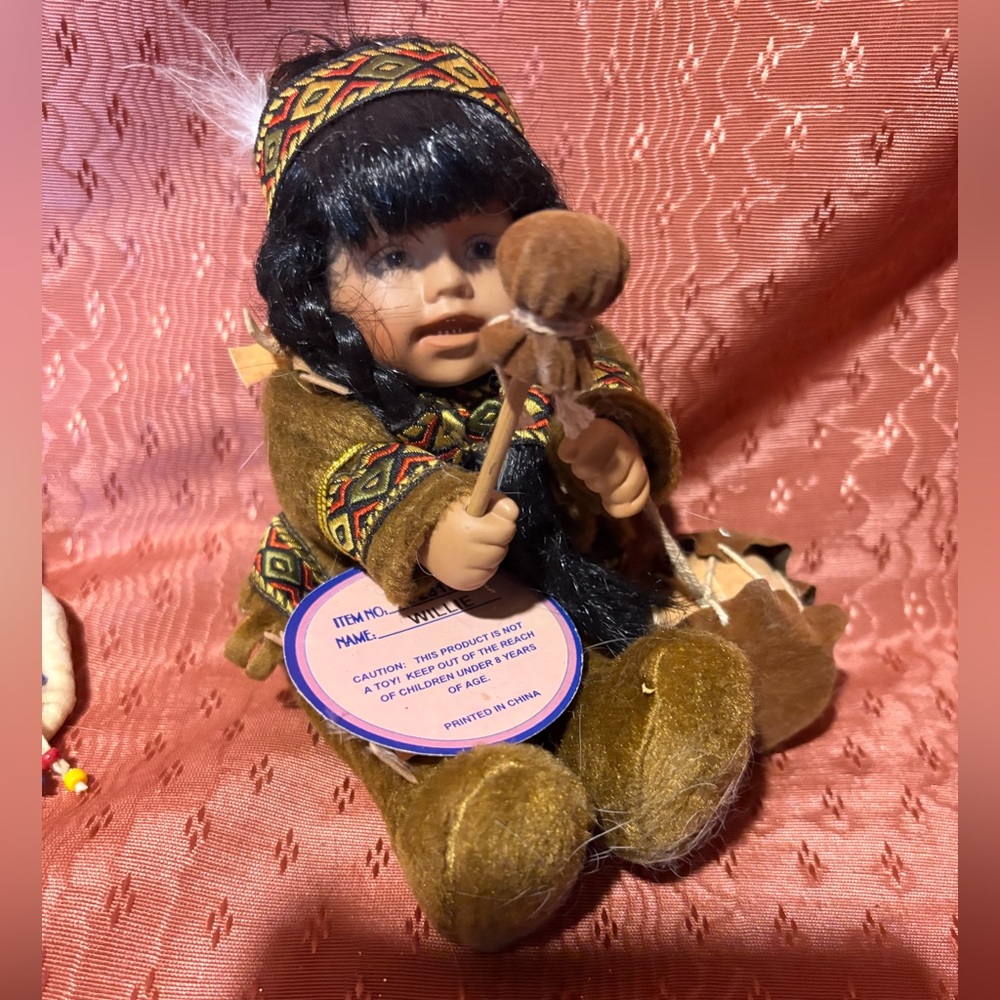 Brown and Black Doll with Drum